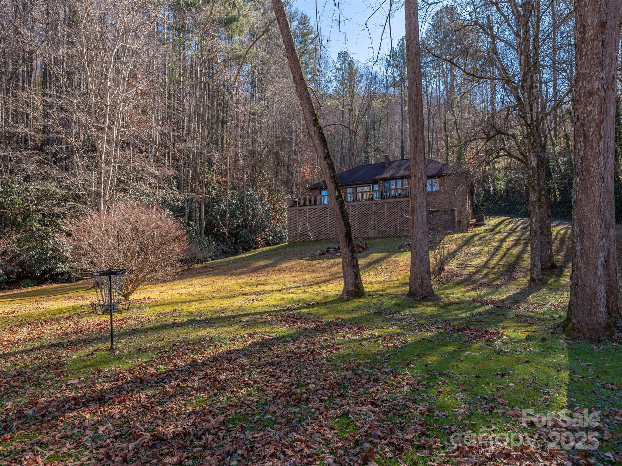 187 Turtle Creek Road Sylva, NC 28779 - Photo 34 of 36 a view of a park with large trees