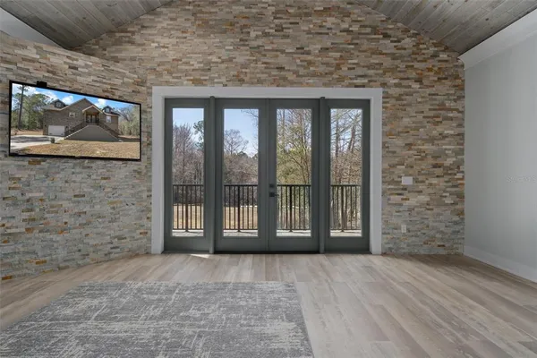 a kitchen with stainless steel appliances a sink stove and refrigerator