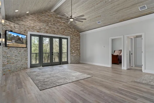 a kitchen with stainless steel appliances a sink stove and cabinets