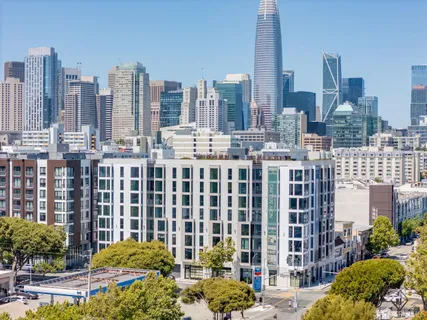 a view of city with tall buildings