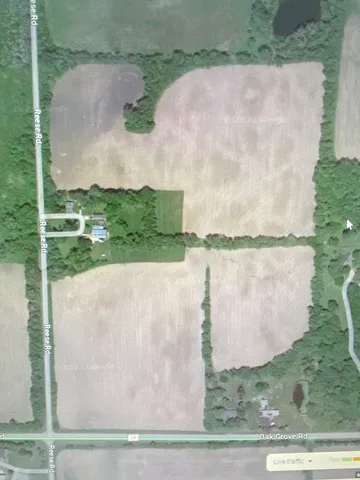 an aerial view of a houses with outdoor space