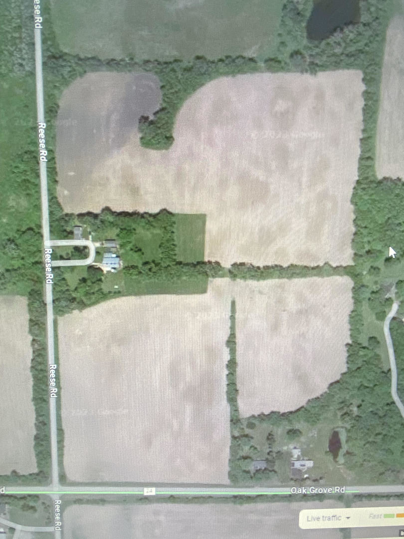 9302 Reese Road Harvard, IL 60033 - Photo 2 of 2 an aerial view of a houses with outdoor space
