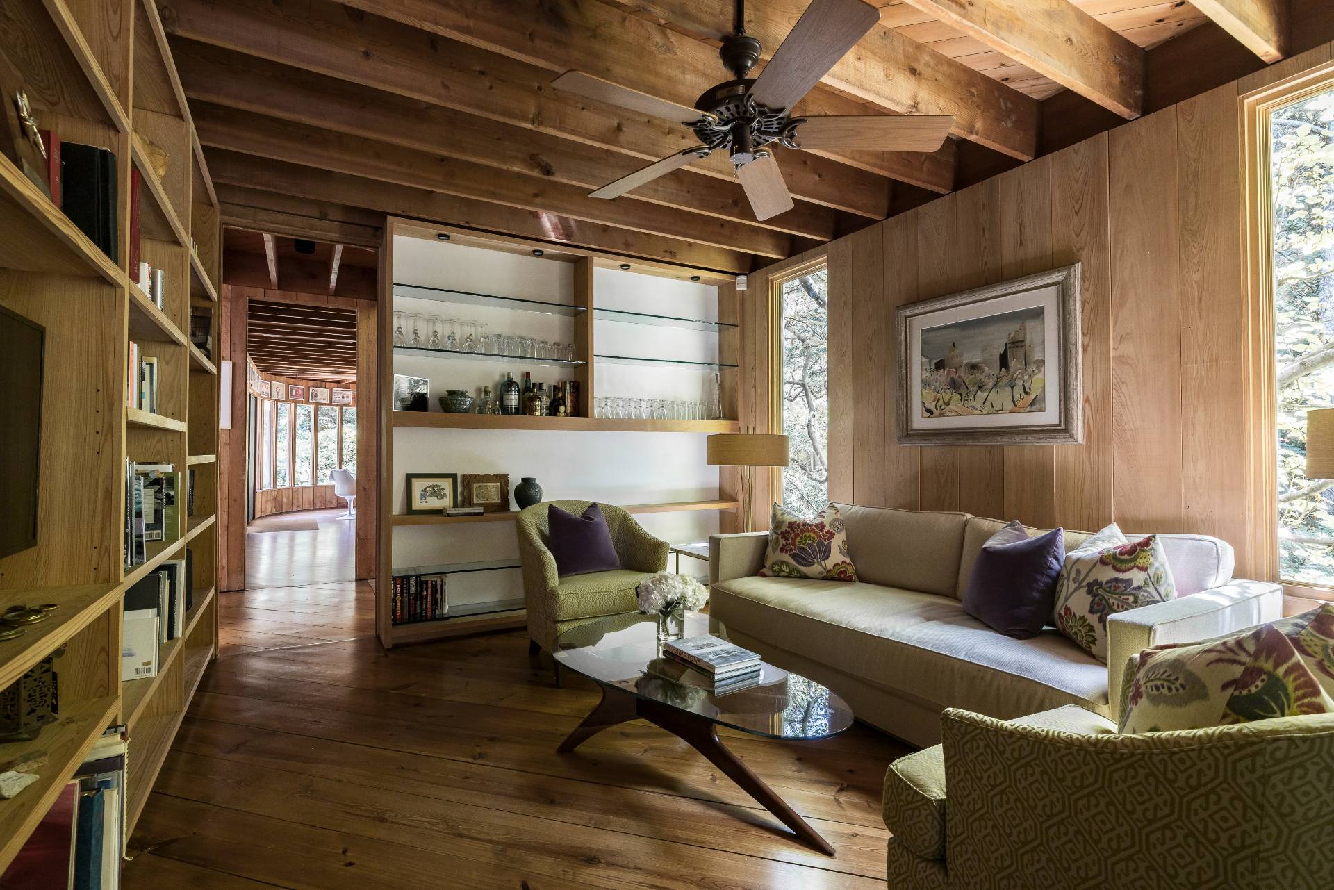 4 Baiting Hollow Road East Hampton, NY 11937 - Photo 11 of 30 a living room with furniture a ceiling fan and a window