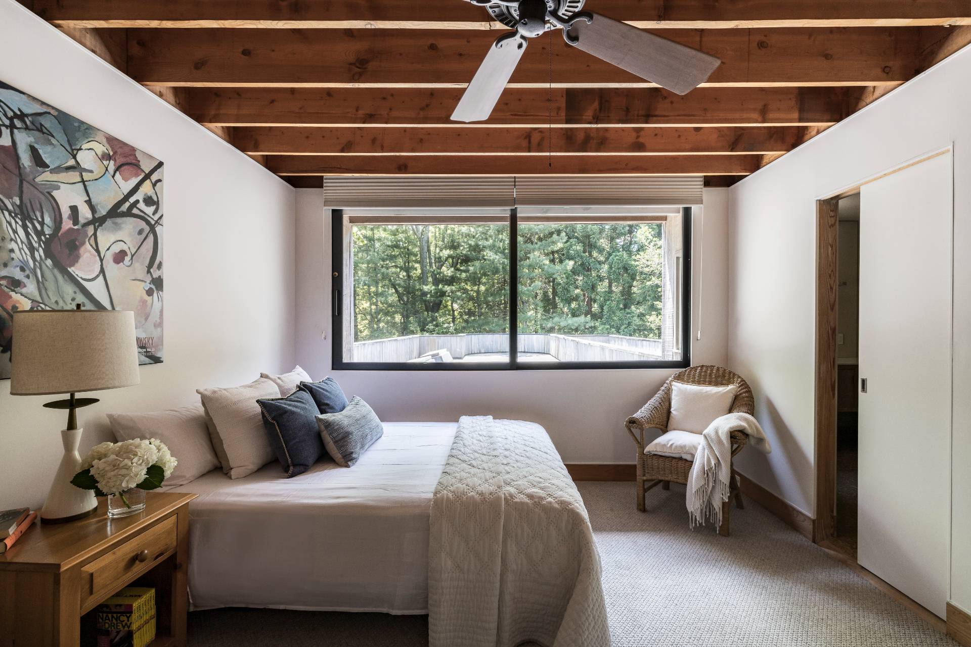 4 Baiting Hollow Road East Hampton, NY 11937 - Photo 18 of 30 a bed room with a bed and a window