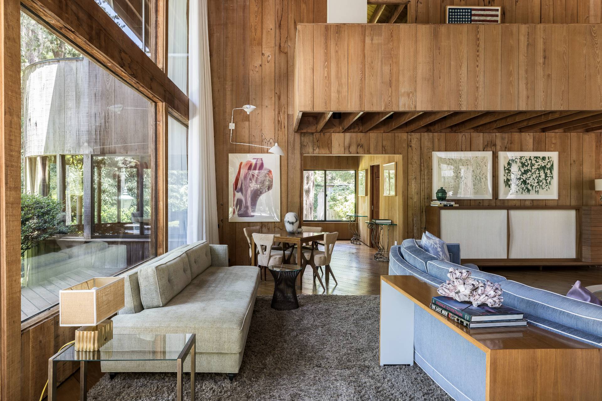 4 Baiting Hollow Road East Hampton, NY 11937 - Photo 4 of 30 a living room with furniture a large window and potted plants