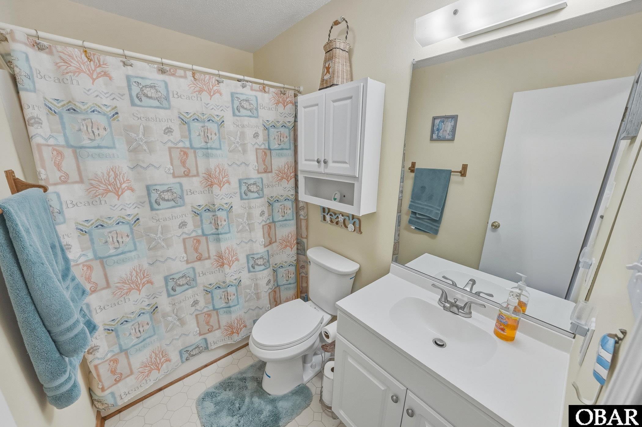 3629 Goosander Street, Unit 3 Kitty Hawk, NC 27949 - Photo 21 of 50 Hallway Bath