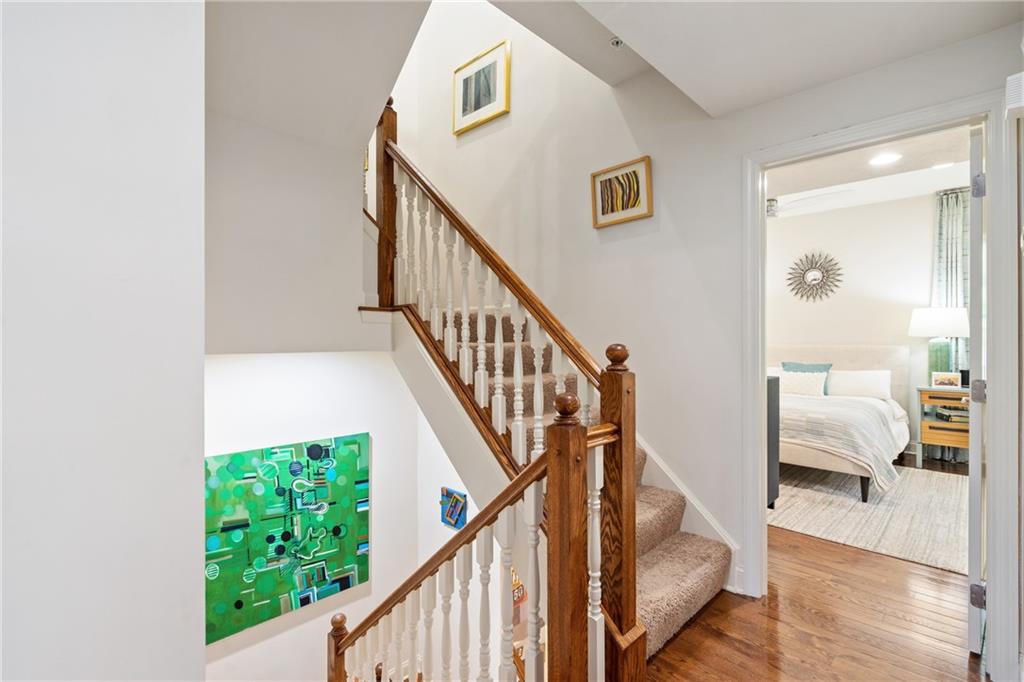 4709 Wallingford Street Pittsburgh, PA 15213 - Photo 12 of 24 a view of front door and bedroom with wooden floor