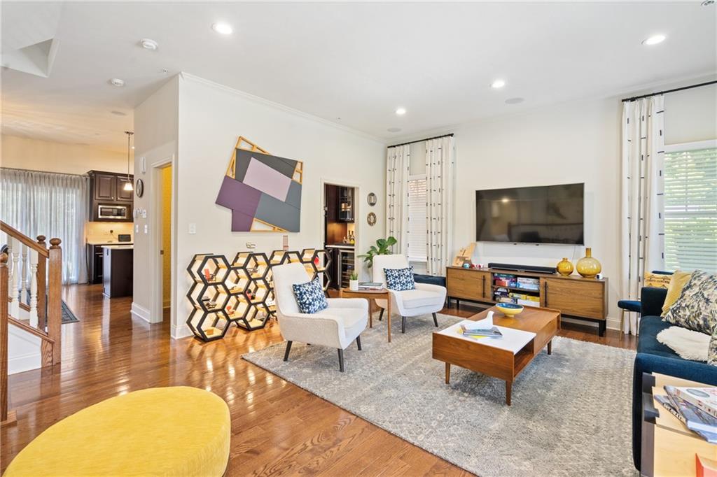 4709 Wallingford Street Pittsburgh, PA 15213 - Photo 2 of 24 a living room with furniture and a flat screen tv