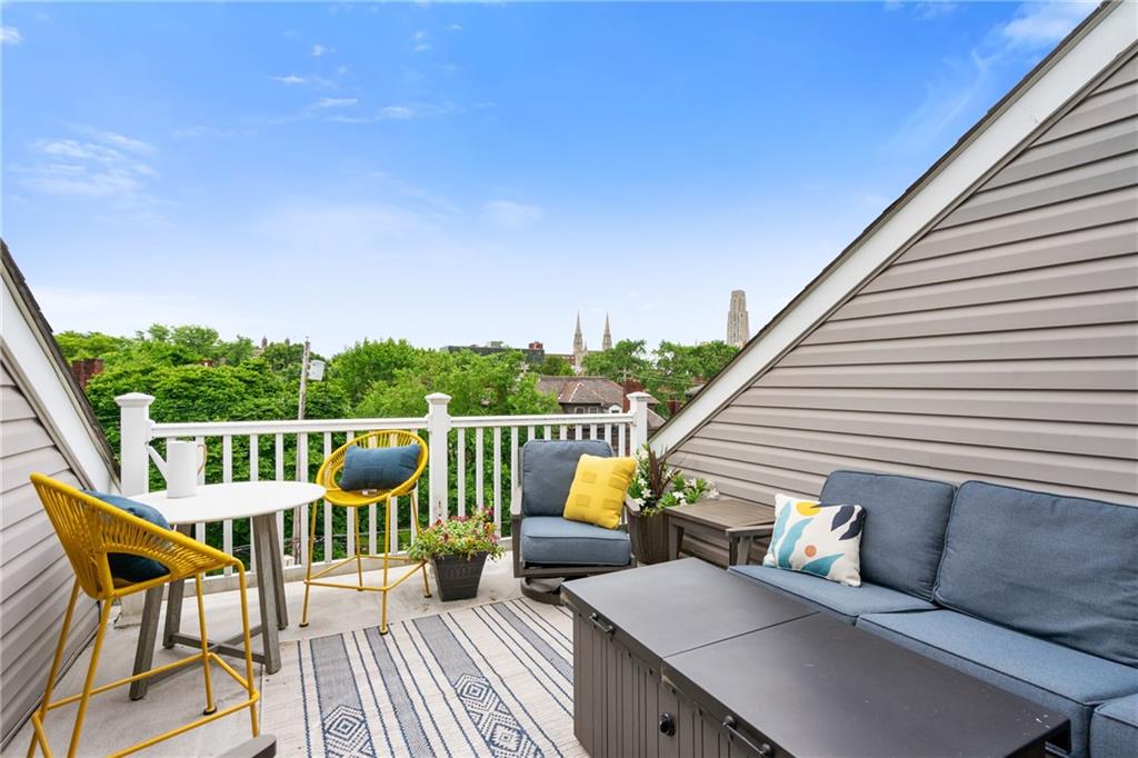 4709 Wallingford Street Pittsburgh, PA 15213 - Photo 21 of 24 a view of a chairs and table on the roof deck