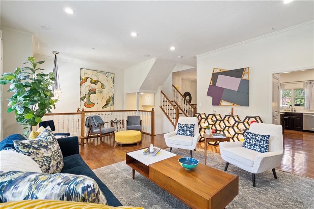 4709 Wallingford Street Pittsburgh, PA 15213 - Photo 3 of 24 a living room with furniture and painting on the wall
