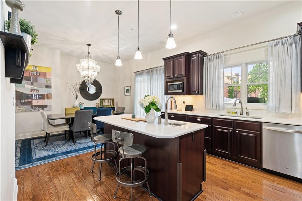 4709 Wallingford Street Pittsburgh, PA 15213 - Photo 7 of 24 a kitchen with a table and chairs in it