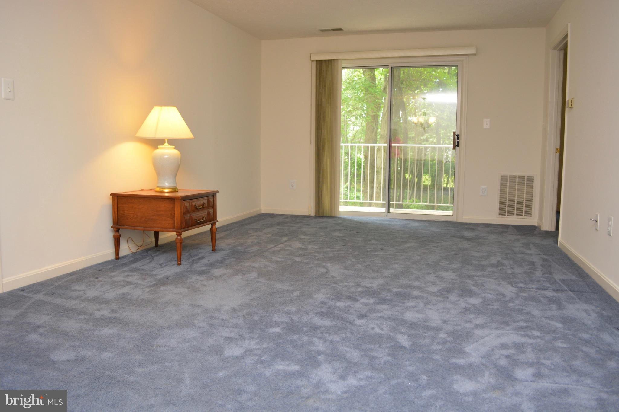 664 Kennington Road, Unit 664 Reisterstown, MD 21136 - Photo 8 of 21 Large Living/Family Rm leading to private balcony!