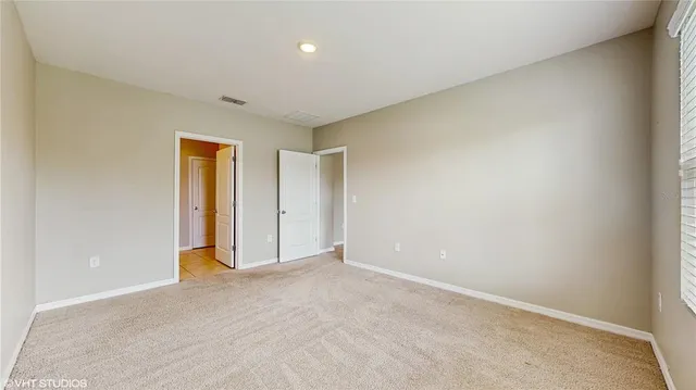 an empty room with an entryway