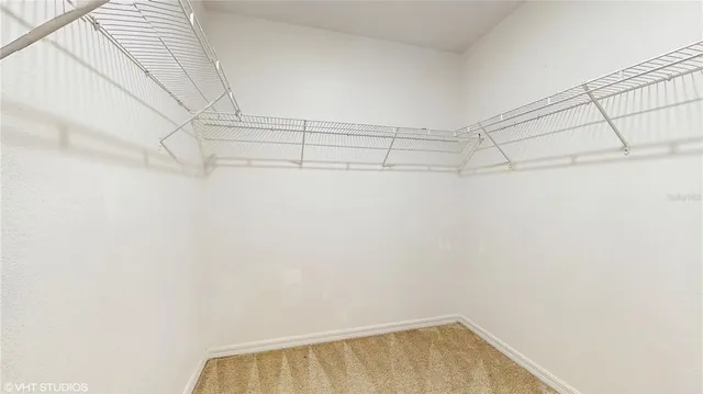 a view of a room with racks on the wall