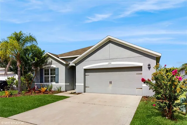 a front view of house with yard