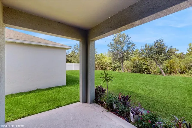 a view of a backyard with garden