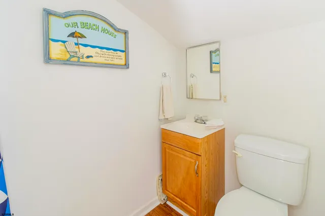 a bathroom with a toilet and a sink