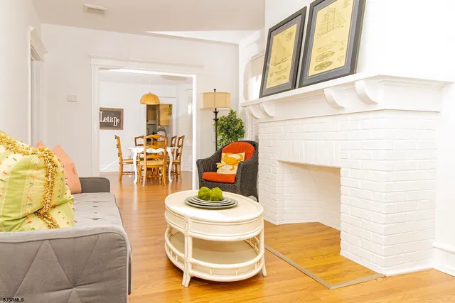 a living room with a couch and a table