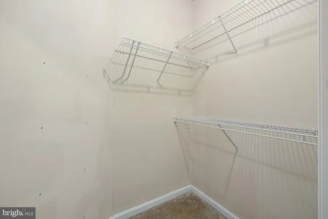 a view of a room with racks on the wall