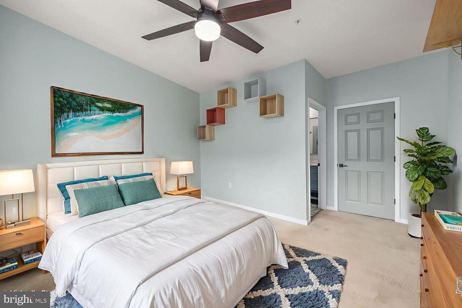 9480 Virginia Center Boulevard, Unit 329 Vienna, VA 22181 - Photo 14 of 30 a bedroom with a bed and a chandelier