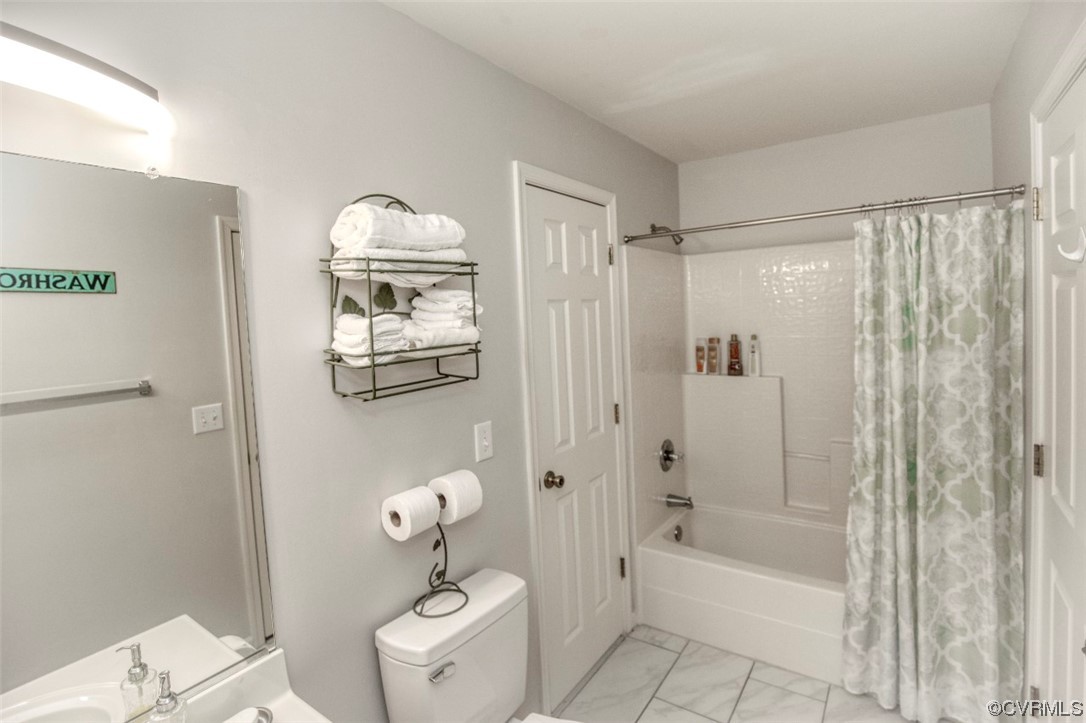 1403 Westgate Circle Williamsburg, VA 23185 - Photo 22 of 42 a bathroom with a shower a toilet and a bathtub