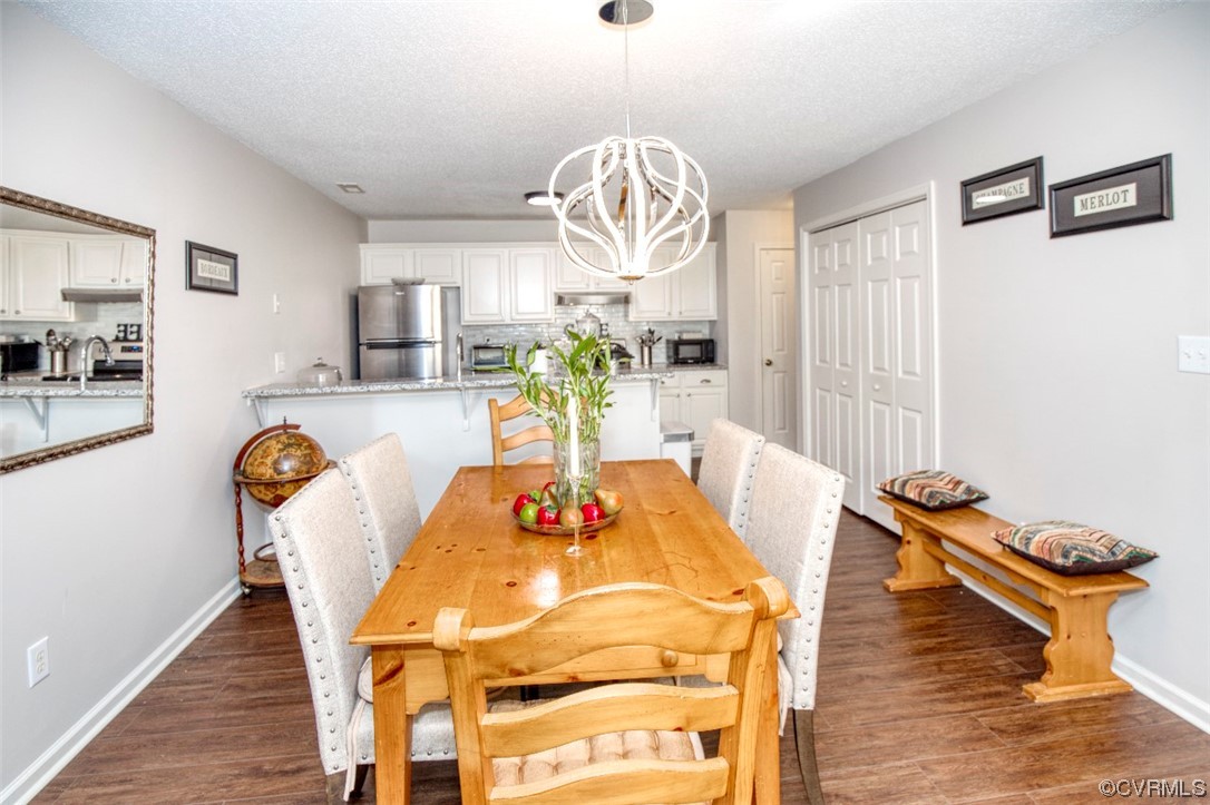 1403 Westgate Circle Williamsburg, VA 23185 - Photo 26 of 42 a dining room with furniture and wooden floor