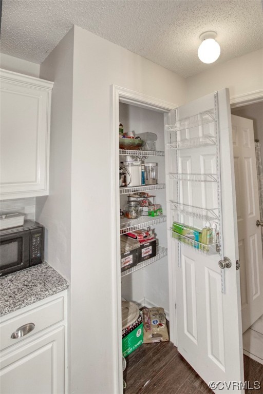 1403 Westgate Circle Williamsburg, VA 23185 - Photo 28 of 42 a kitchen with a refrigerator and a sink