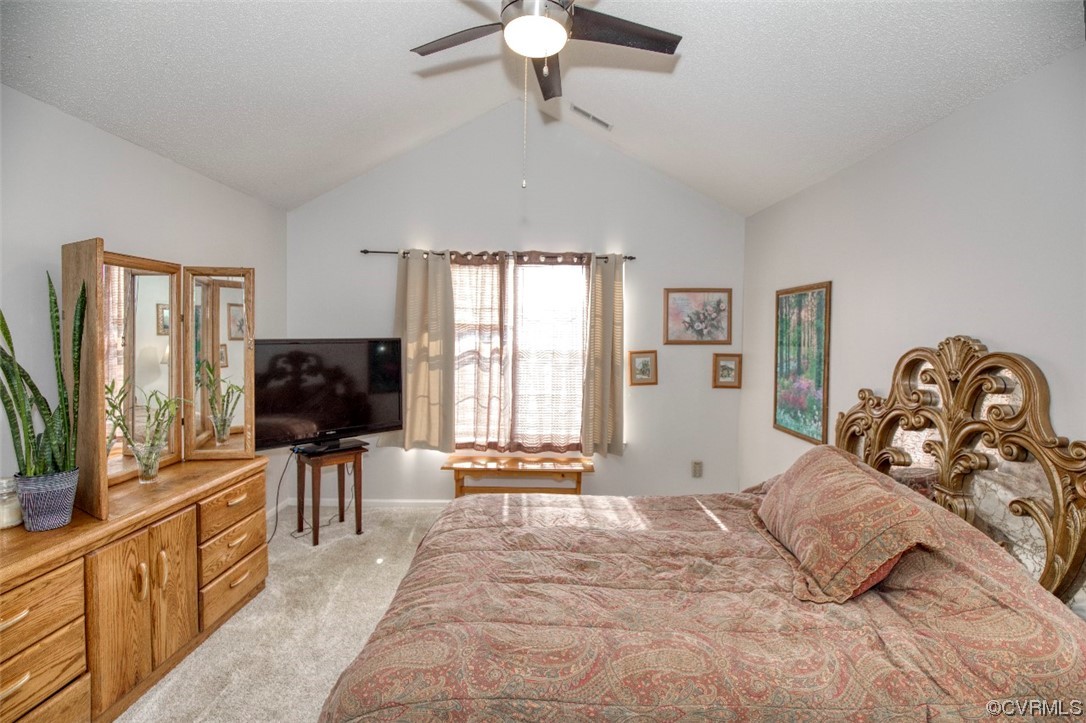 1403 Westgate Circle Williamsburg, VA 23185 - Photo 36 of 42 a bedroom with a bed and a flat screen tv