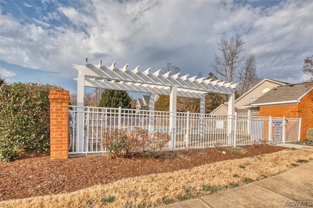 1403 Westgate Circle Williamsburg, VA 23185 - Photo 39 of 42 a view of a brick house with a large windows