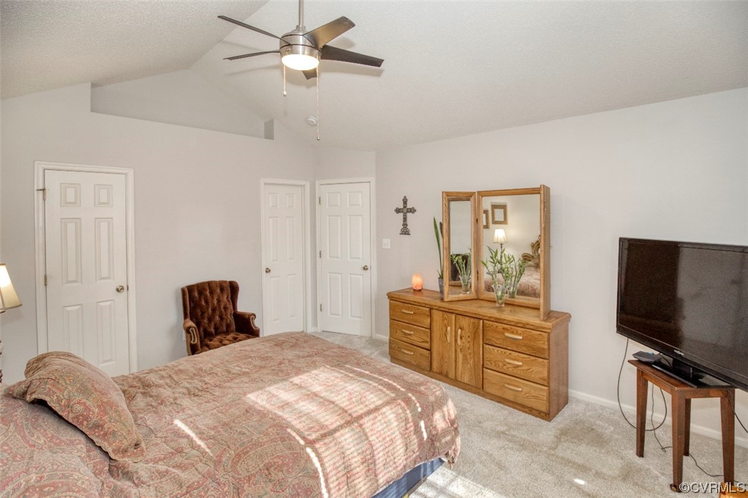 1403 Westgate Circle Williamsburg, VA 23185 - Photo 41 of 42 a bedroom with a bed and a television