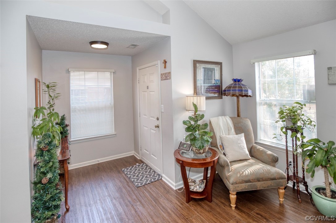 1403 Westgate Circle Williamsburg, VA 23185 - Photo 5 of 42 a living room with furniture and a potted plant
