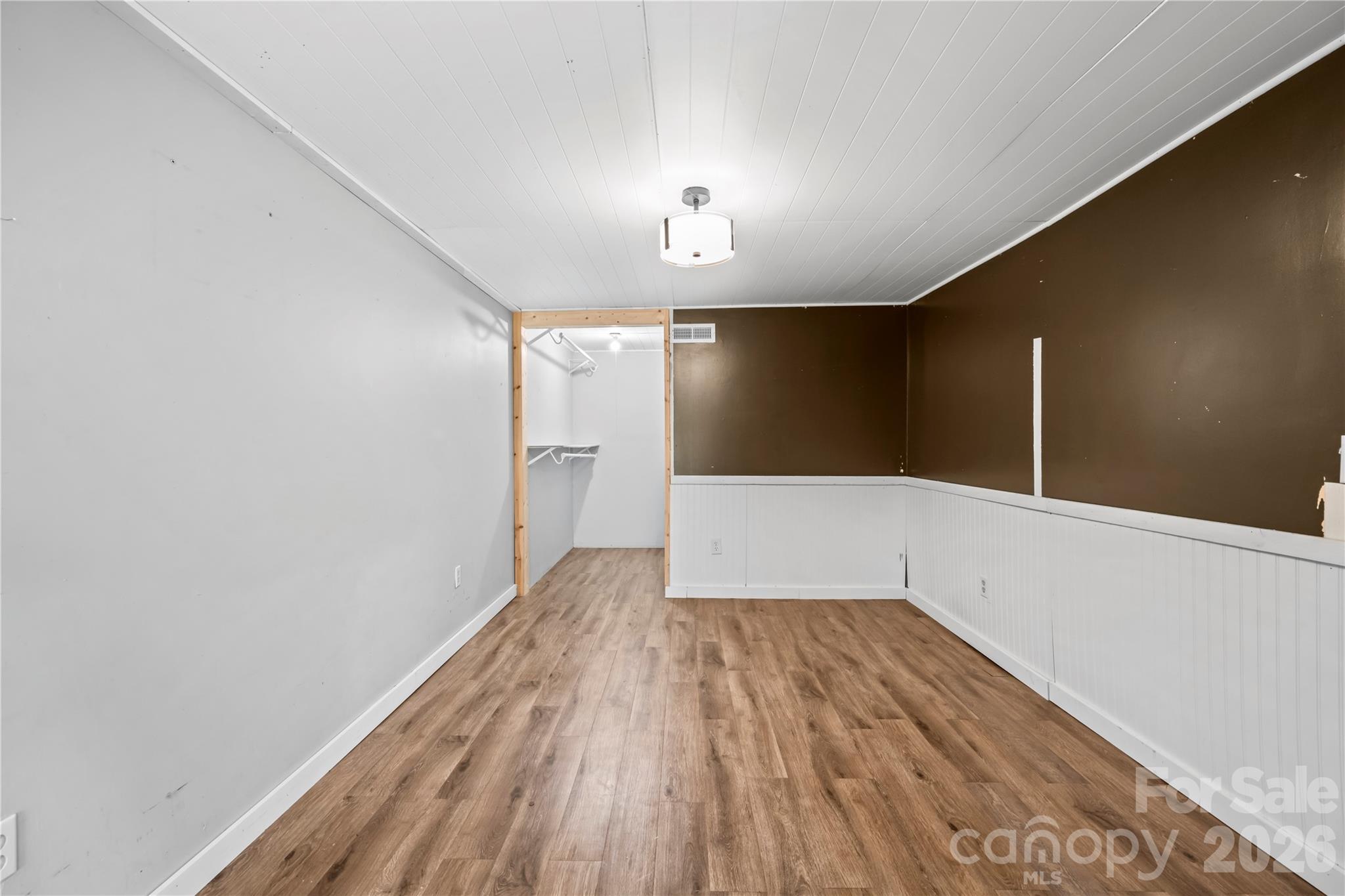 882 Queentown Road Canton, NC 28716 - Photo 25 of 33 a view of wooden floor in an empty room