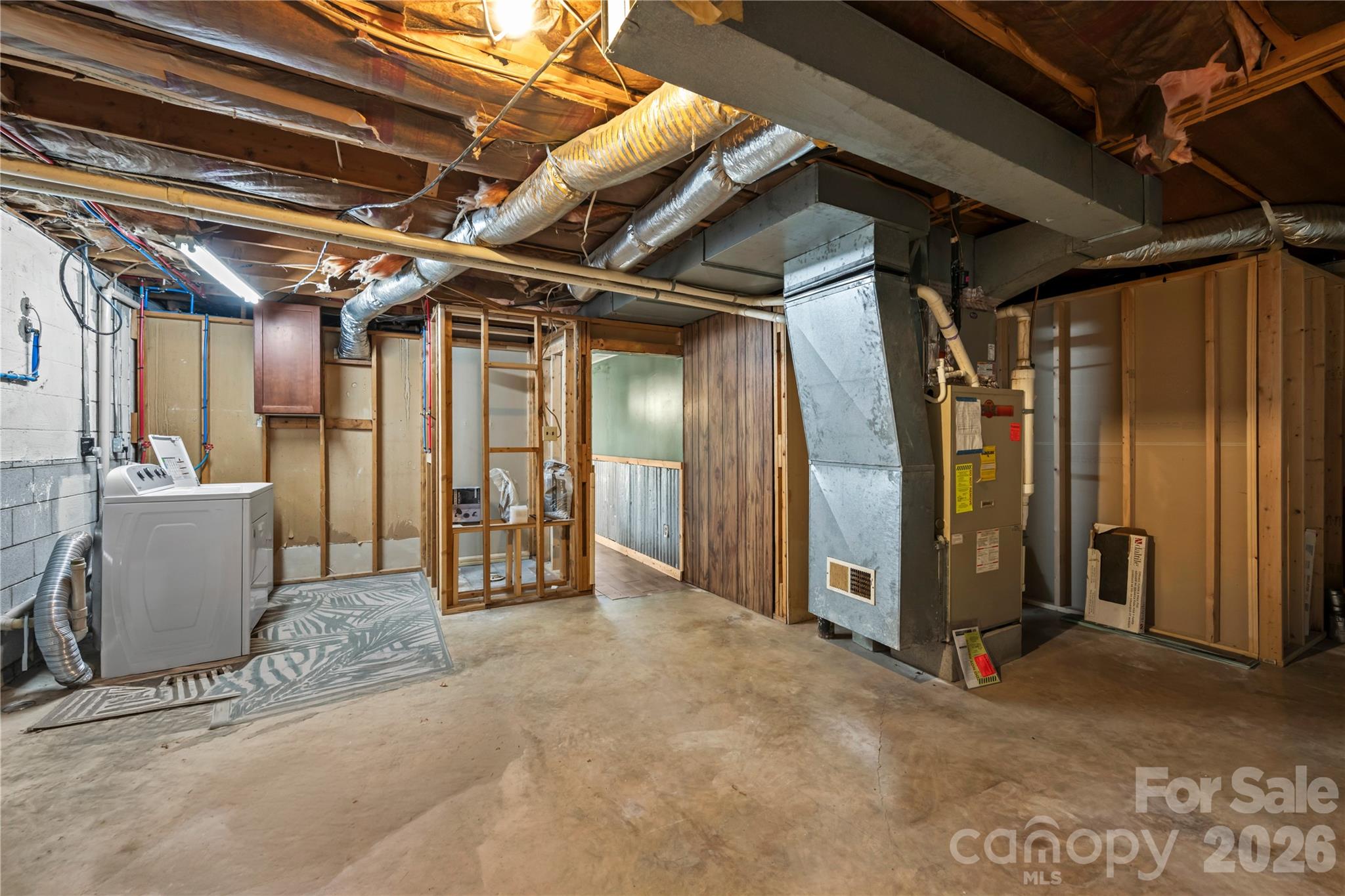 882 Queentown Road Canton, NC 28716 - Photo 27 of 33 a view of an empty room with wooden walls