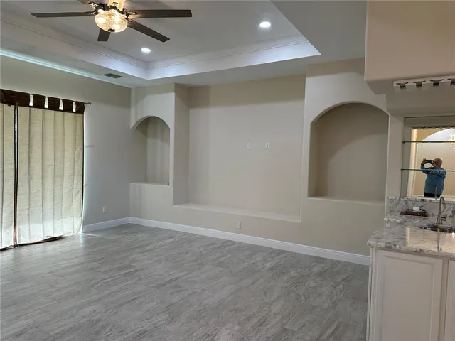 a view of a livingroom with furniture and wooden floor