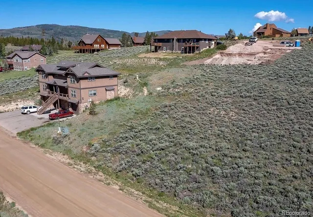 a view of a houses with trees