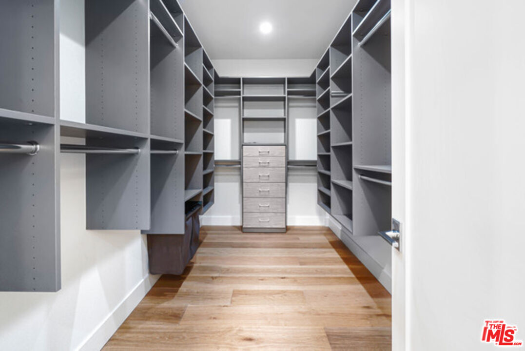 7263 Birdview Avenue Malibu, CA 90265 - Photo 10 of 17 a view of walk in closet with empty racks