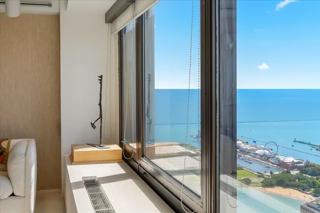 a bathroom with a tub and shower