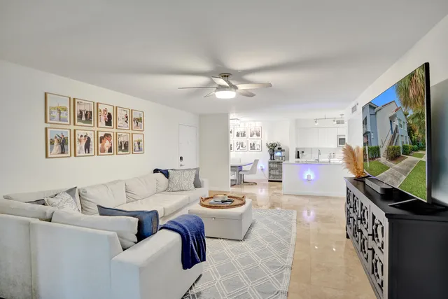 a large white bed in a white room