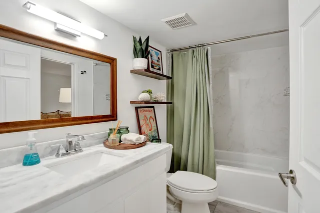 a view of a backyard with garden