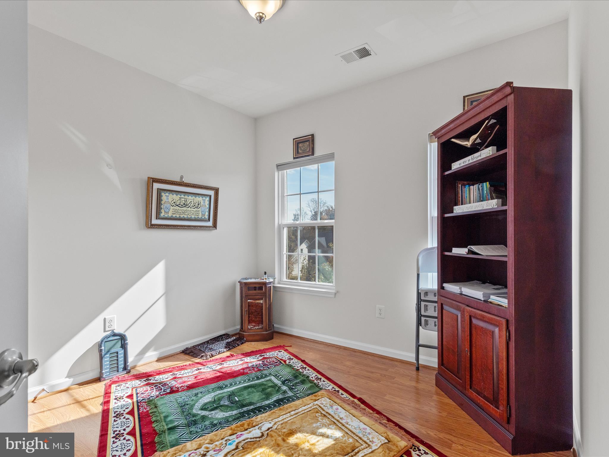 2804 St Marys View Road Accokeek, MD 20607 - Photo 21 of 37 a bedroom with a bed and a dresser