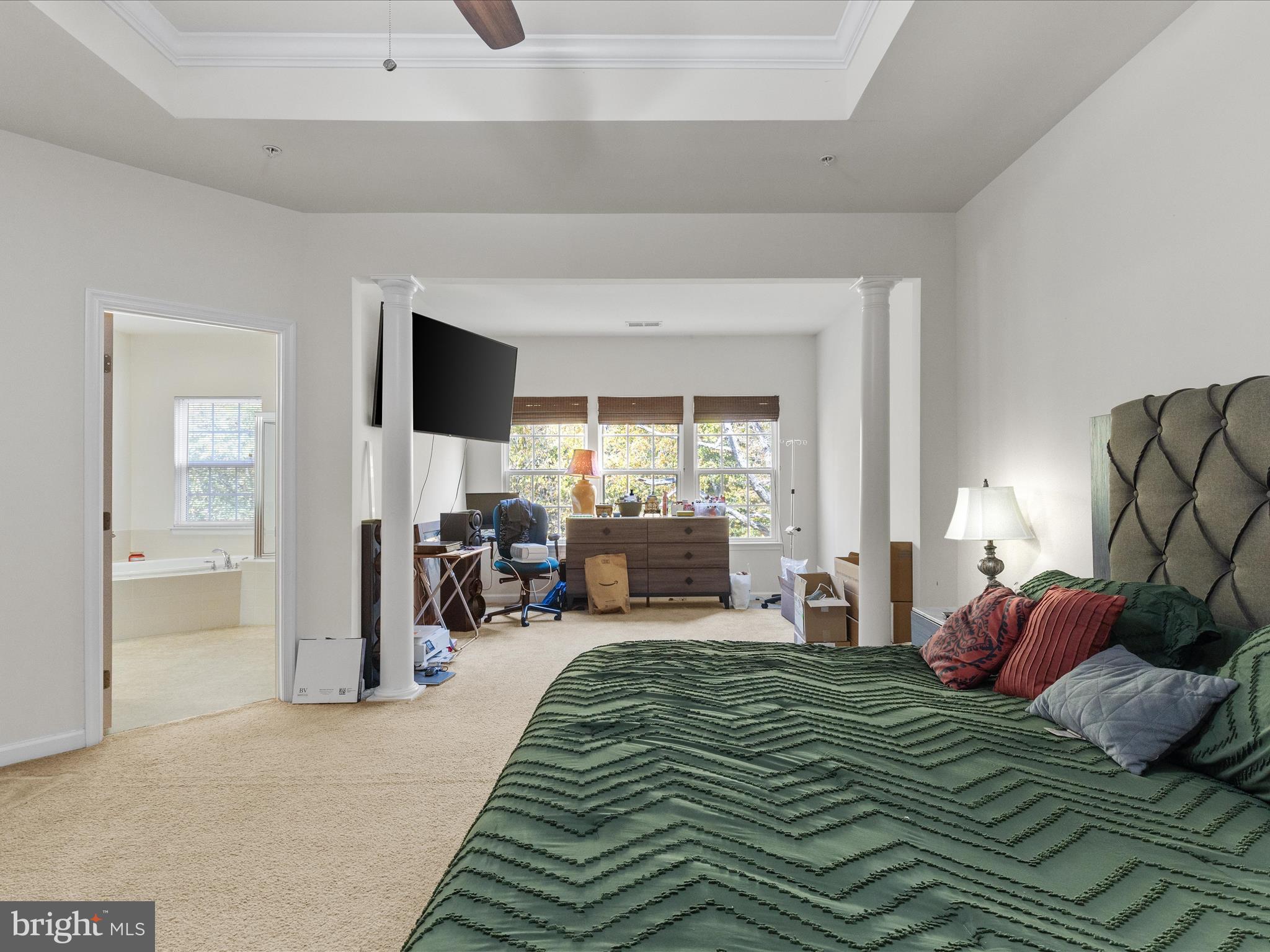 2804 St Marys View Road Accokeek, MD 20607 - Photo 26 of 37 a bedroom with a bed and large windows