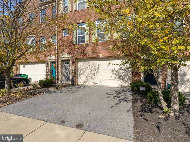 a view of a road with a building in the background