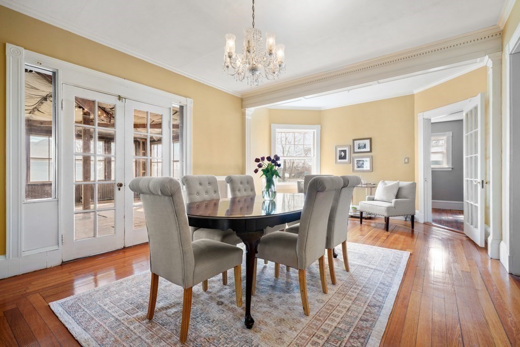 3 Rundel Park Boston, MA 02124 - Photo 11 of 31 a view of a dining room with furniture and wooden floor