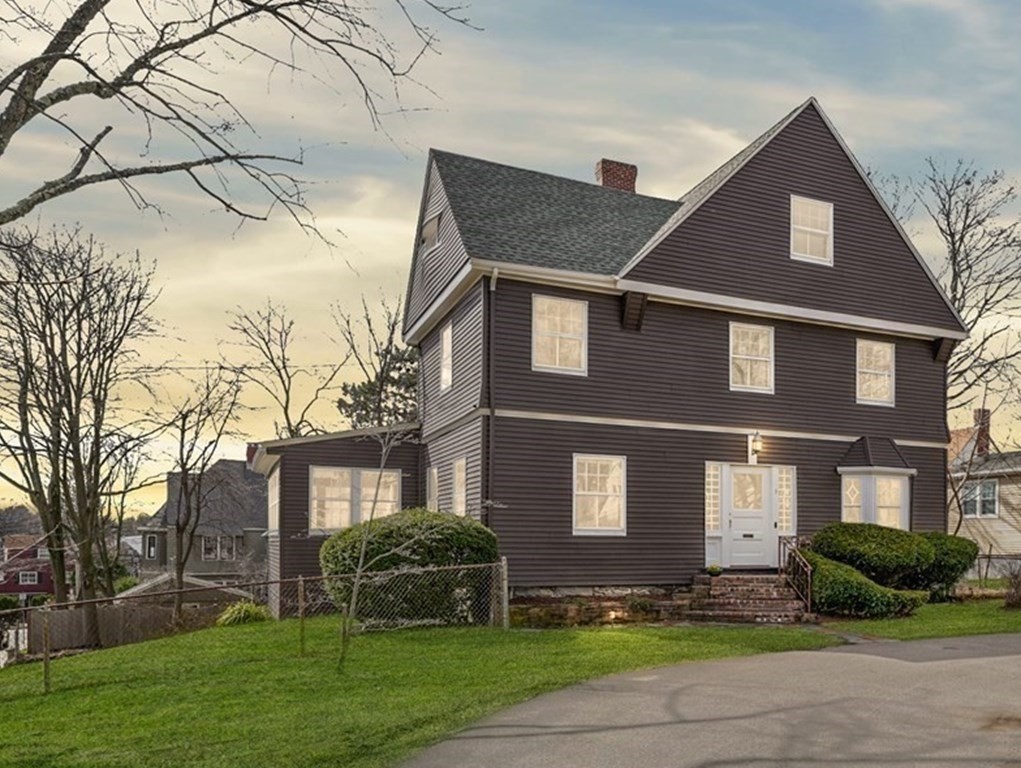 3 Rundel Park Boston, MA 02124 - Photo 2 of 31 a front view of a house with a yard