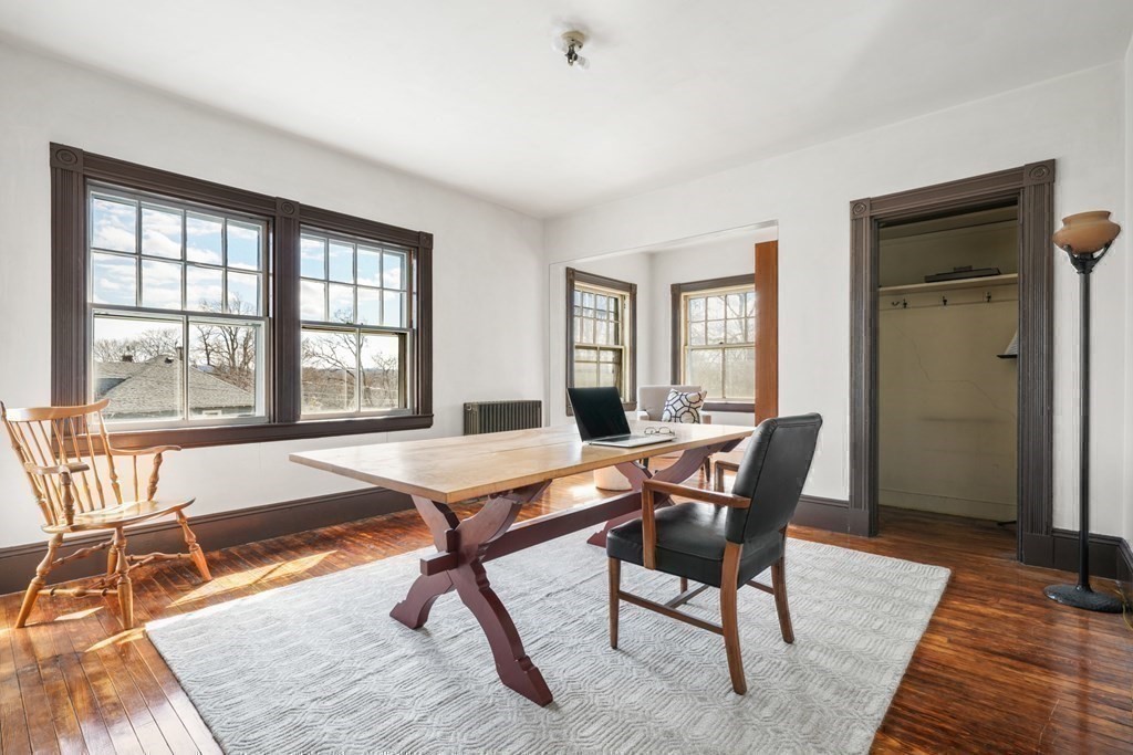 3 Rundel Park Boston, MA 02124 - Photo 27 of 31 a dining room with a table and chairs