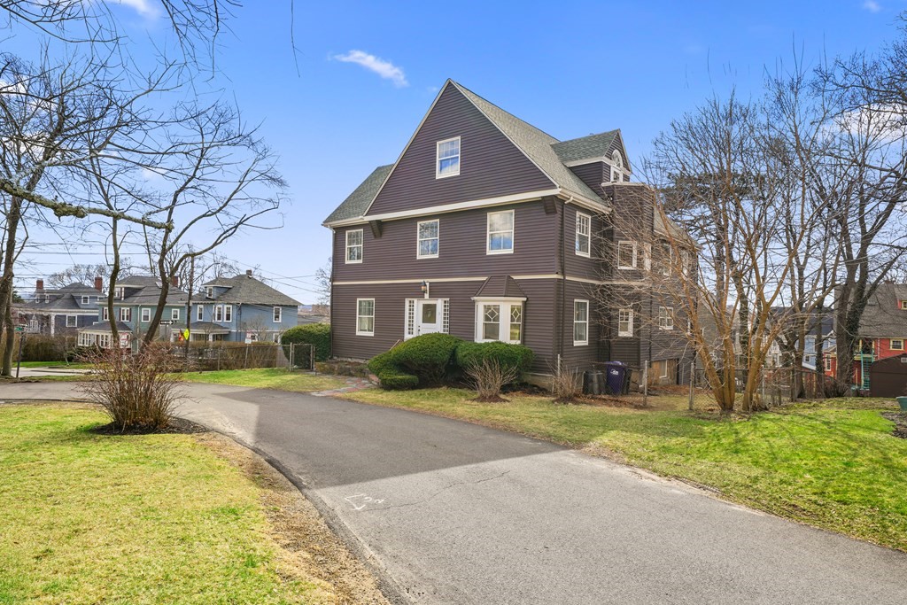 3 Rundel Park Boston, MA 02124 - Photo 31 of 31 a front view of a house with a yard