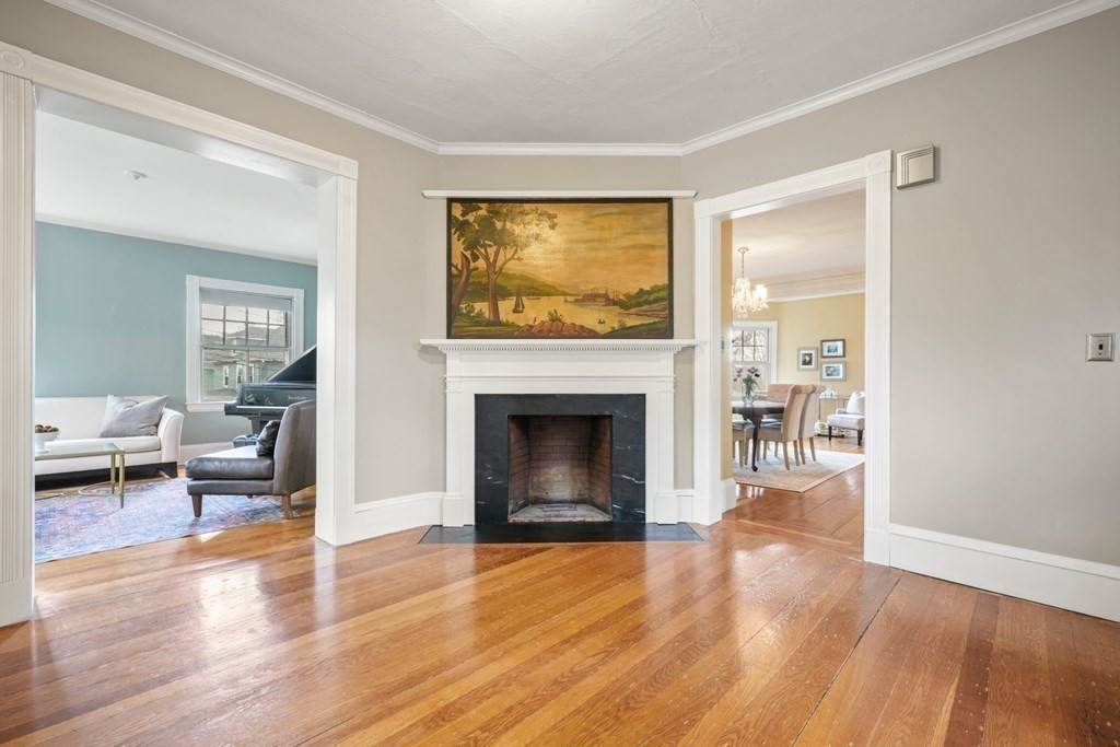 3 Rundel Park Boston, MA 02124 - Photo 4 of 31 a living room with furniture and a fireplace