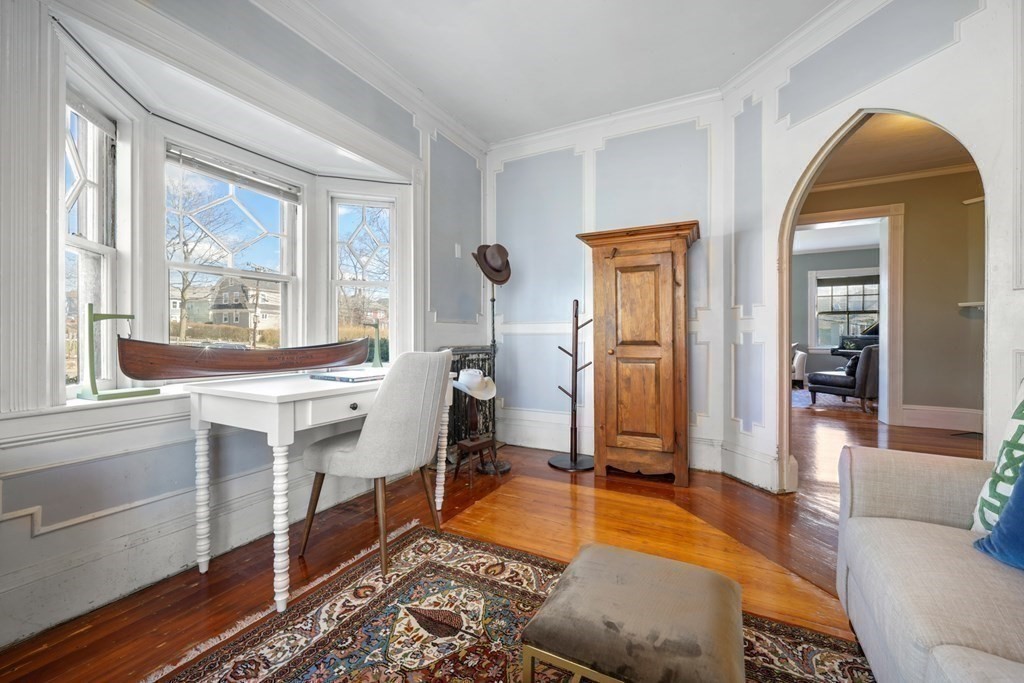 3 Rundel Park Boston, MA 02124 - Photo 10 of 31 a spacious bedroom with a bed and a large window