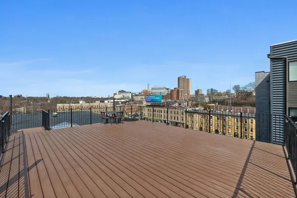 a view of a balcony with city view