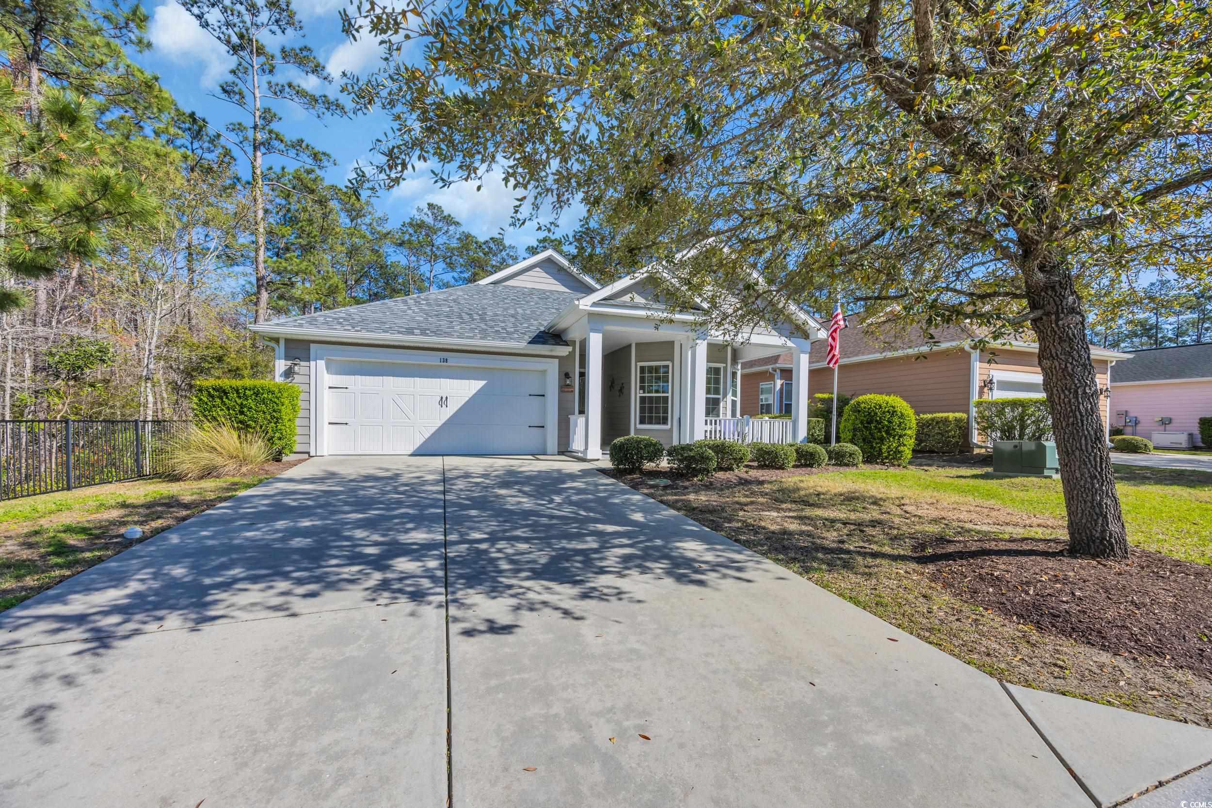 138 Sugar Loaf Lane Murrells Inlet, SC 29576 - Photo 1 of 38 View of front of property featuring fence, a garag